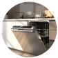 a stainless steel dishwasher partially open